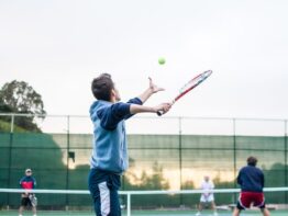 Tennis Player Hitting a Serve